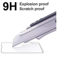 Utility knife blade demonstrating the scratch-proof feature of a 9H hardness glass screen protector.