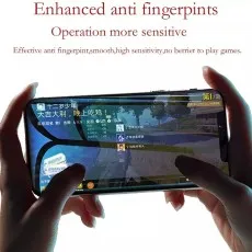 Person playing a game on Tecno Pop 6 Pro with an anti-fingerprint, high-sensitivity screen protector