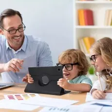 Samsung Galaxy Tab A9 Plus 2023 leather cover case in use during a family activity with integrated stand