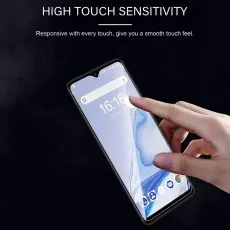 Tecno Spark Go 2023 with a screen protector, showing high touch sensitivity as a finger interacts