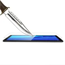 Knife blade pointed at a screen protector on a Samsung A05 illustrating the scratch-resistant nature of the protector
