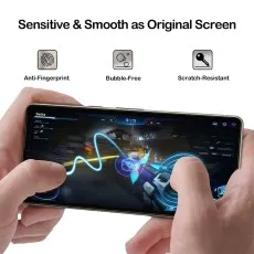 Hands playing a mobile game on Vivo Z5x with a screen protector. Anti-fingerprint, bubble-free.