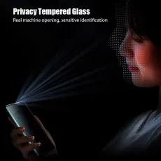 real machine opening, sensitive identification. Woman using face unlock on her phone..