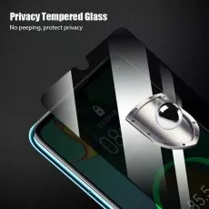 Privacy screen protector being applied to a Huawei phone. No peeping, protect privacy. Bubble removal..