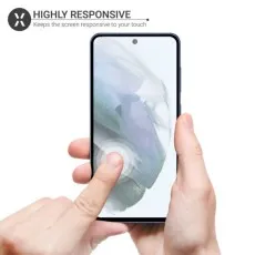A close-up of hands touching a smartphone screen with a highly responsive screen protector