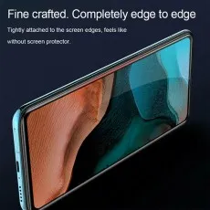 A smartphone with an edge to edge screen protector, showcasing its seamless fit on the display