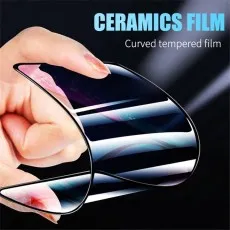 Hand holding a flexible, curved ceramic film screen protector