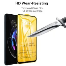 A smartphone with a 9D tempered glass screen protector being stabbed by a knife