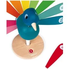 A Janod wooden peacock toy with numbered, multi-colored tail feathers.