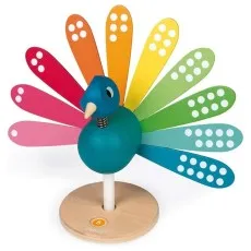 A Janod wooden peacock with rainbow-colored feathers, some with white dots.