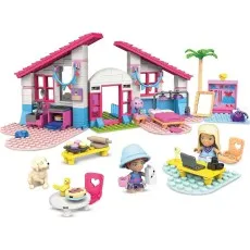 A wide shot of the complete MEGA Barbie Malibu House with all its accessories and dolls