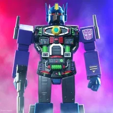 Close-up of purple and blue Optimus Prime with open chest revealing intricate internal mechanics and holding a gun