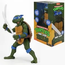 Giant-Sized Teenage Mutant Ninja Turtles Leonardo figure holding two katanas, next to its large box.