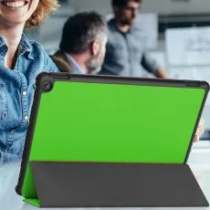 Woman using a Kindle Fire HD 10 in a green trifold stand case during a meeting